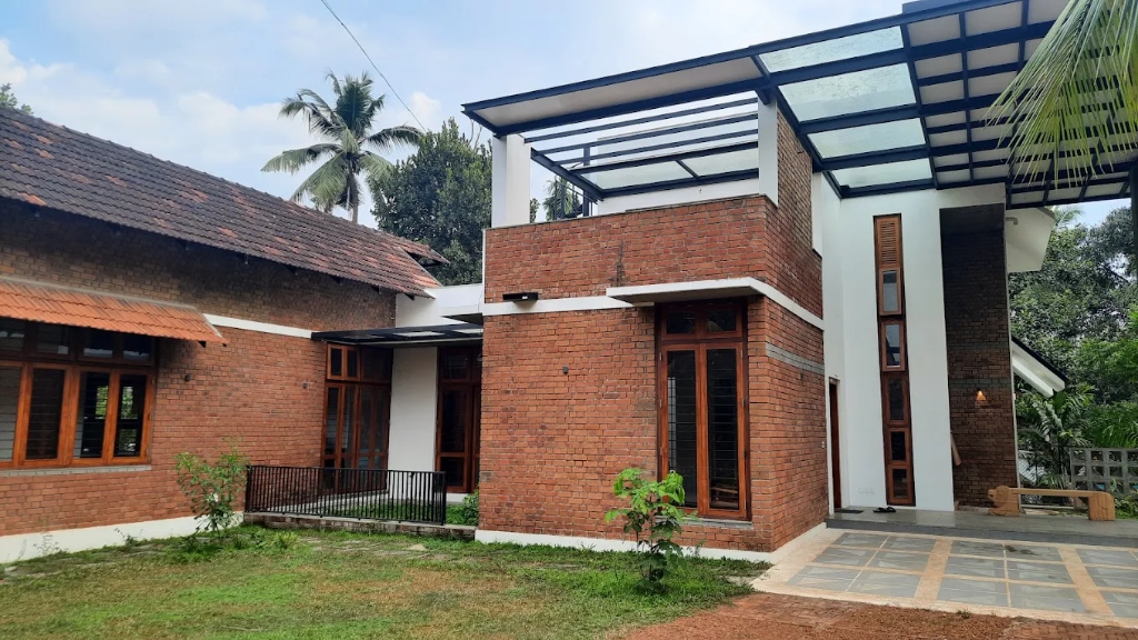 Daytime Earth Brick & Glass Canopy Villa Facade